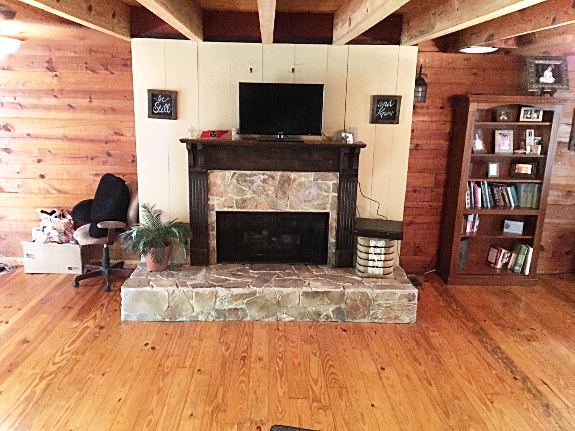 3879 Clarity Road Springfield, TN 37172 - Photo 14 of 28 a living room with furniture and a fireplace