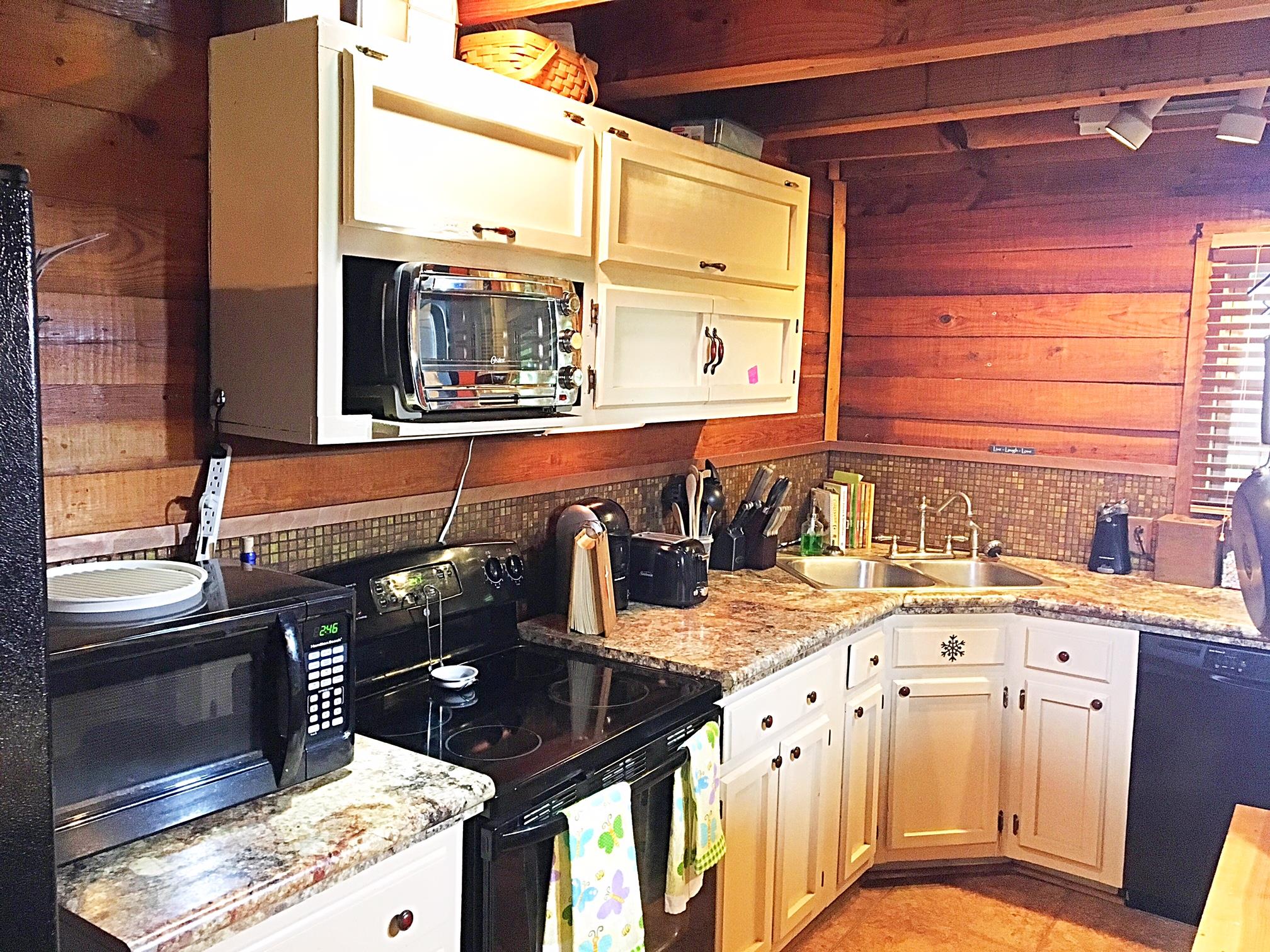 3879 Clarity Road Springfield, TN 37172 - Photo 17 of 28 a kitchen with a sink stove and cabinets