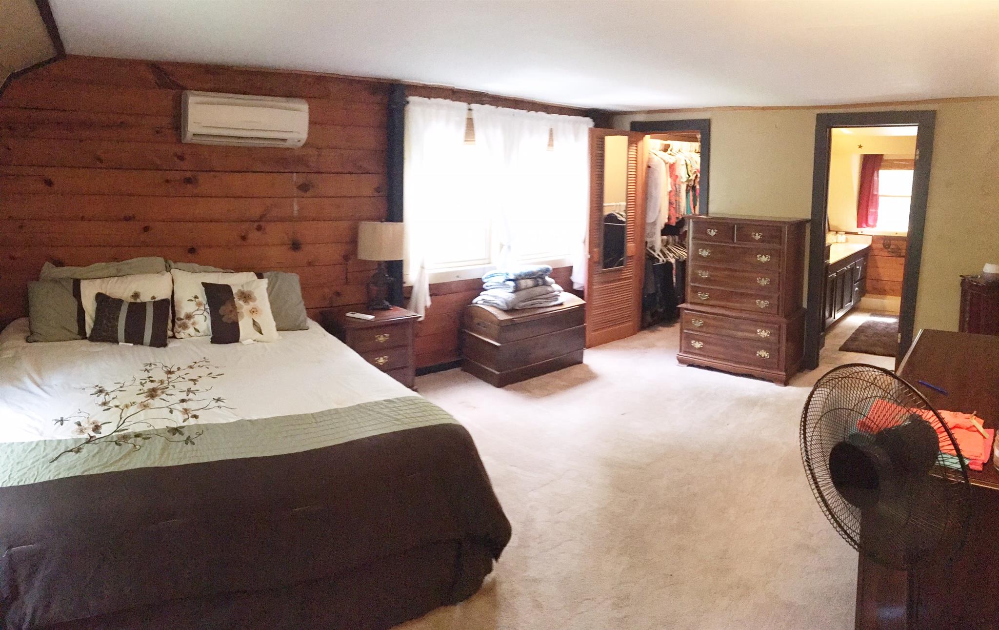 3879 Clarity Road Springfield, TN 37172 - Photo 19 of 28 a bedroom with a bed and dresser with mirror