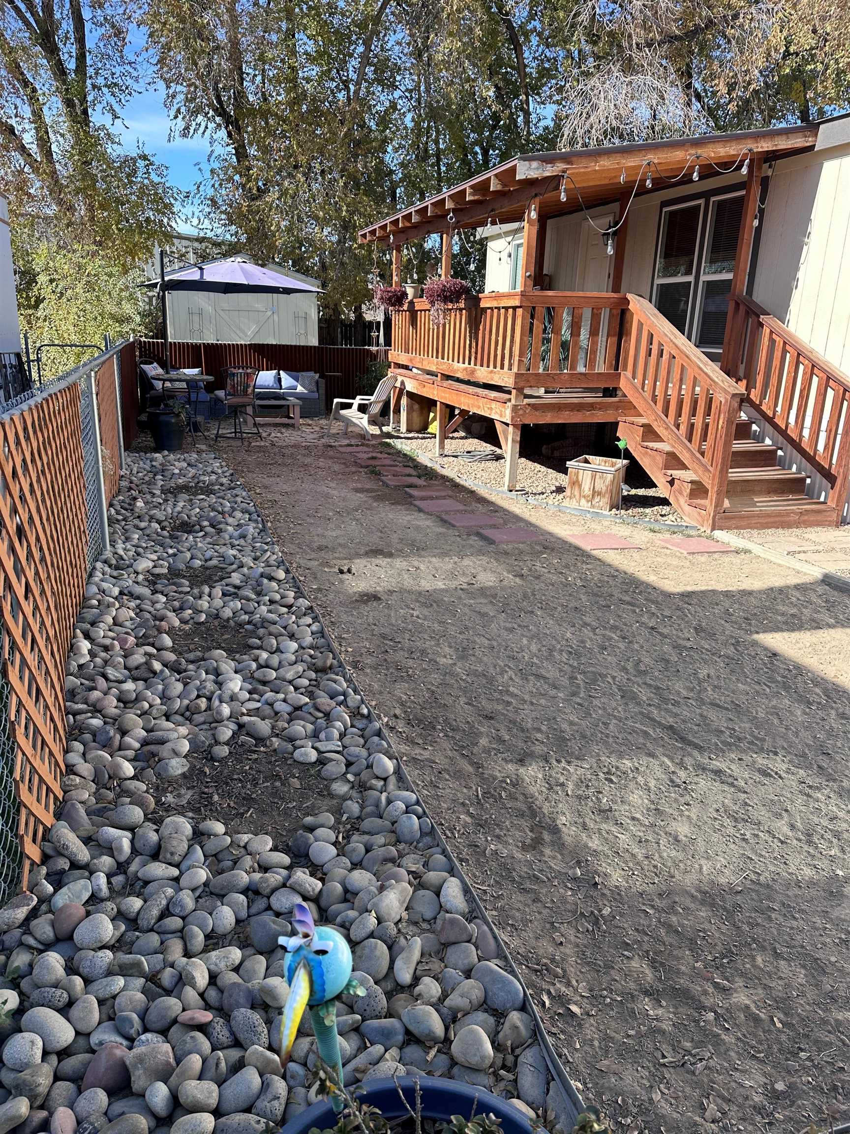 585-25 25 1/2 Road, Unit 125 Grand Junction, CO 81505 - Photo 23 of 24 an outdoor view of house with backyard