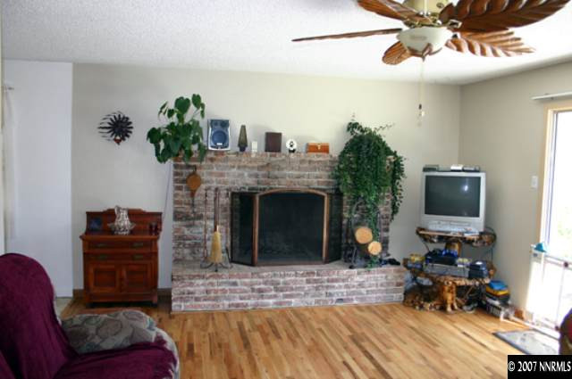 1285 Beldon Way Reno, NV 89503 - Photo 3 of 8 a living room with furniture and a fireplace