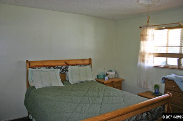 1285 Beldon Way Reno, NV 89503 - Photo 5 of 8 a bedroom with a bed and window