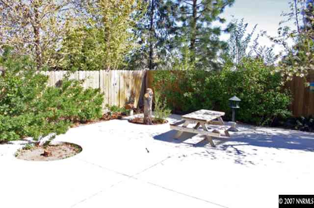 1285 Beldon Way Reno, NV 89503 - Photo 8 of 8 a view of a backyard with a tree