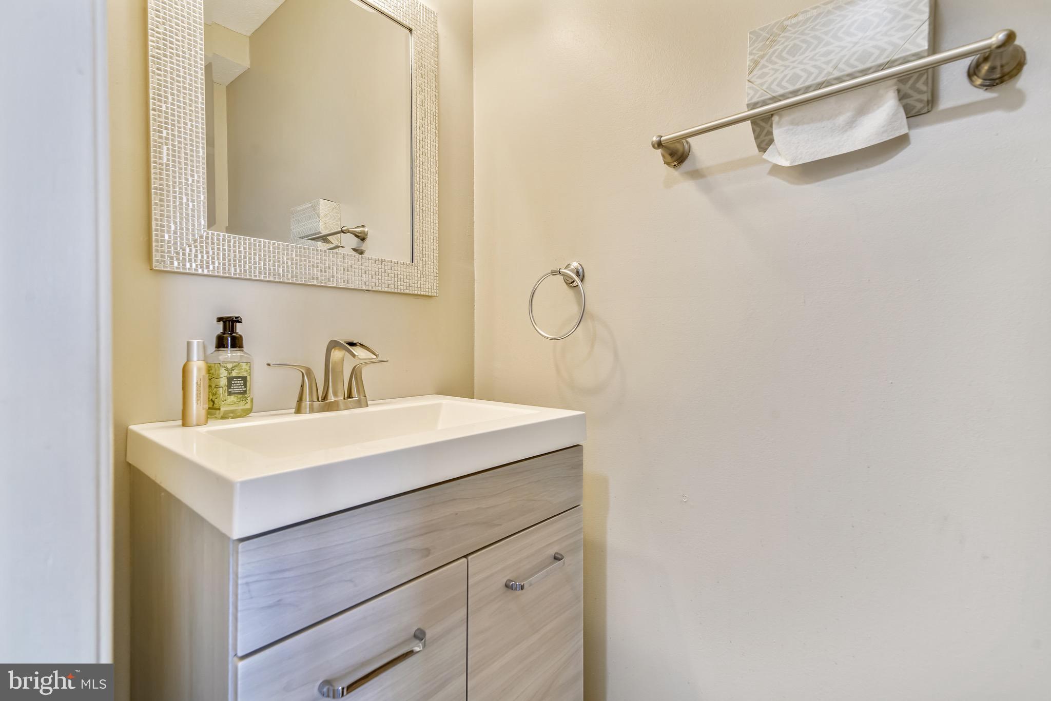 1305 Old Cannon Road Fort Washington, MD 20744 - Photo 14 of 30 Powder Room on main floor on way to kitchen