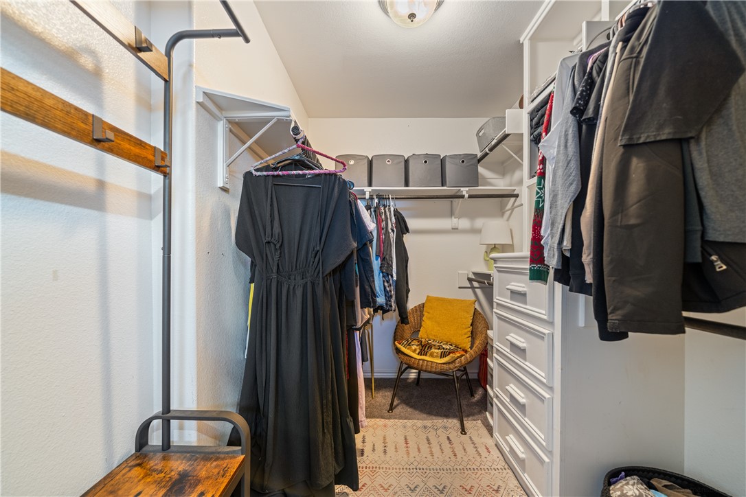7442 Russ Lane Corpus Christi, TX 78414 - Photo 18 of 29 a view of walk in closet with clothes and shoes