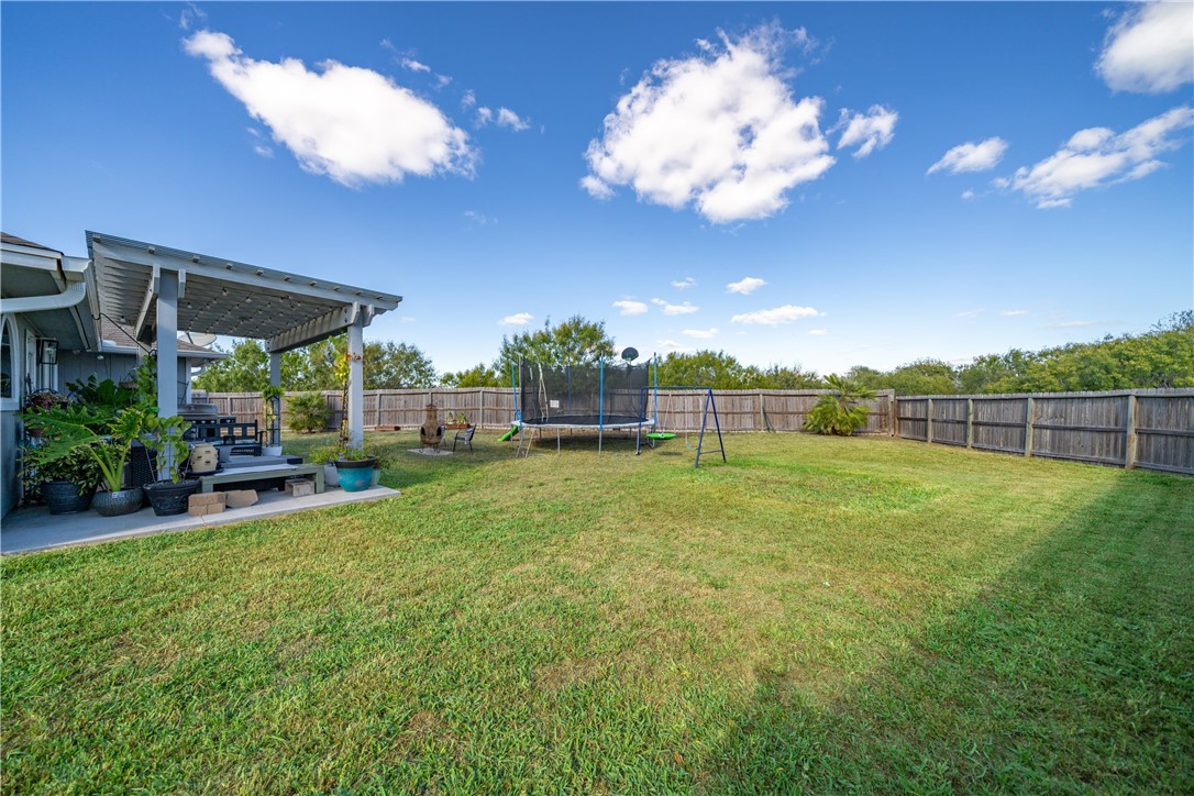 7442 Russ Lane Corpus Christi, TX 78414 - Photo 25 of 29 a view of a garden with a slide