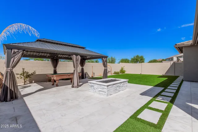 an aerial view of residential houses and outdoor space