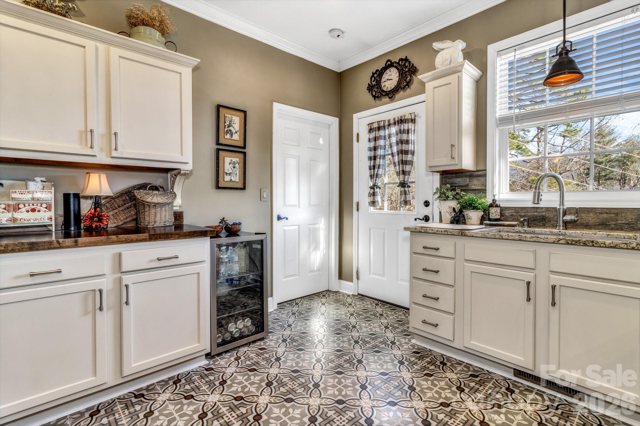 25 Union Chapel Road Weaverville, NC 28787 - Photo 14 of 43 a kitchen with granite countertop a sink cabinets and window