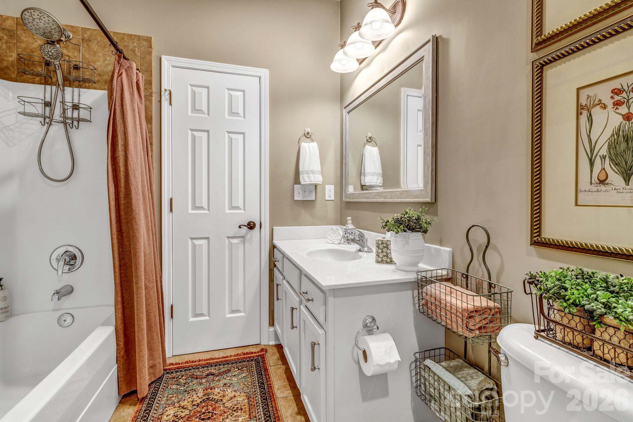 25 Union Chapel Road Weaverville, NC 28787 - Photo 20 of 43 a bathroom with a sink toilet and shower