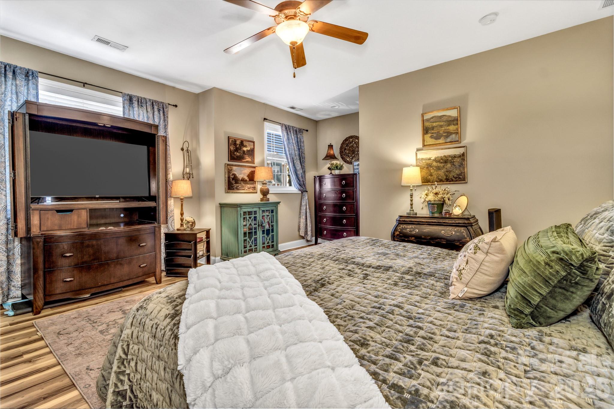 25 Union Chapel Road Weaverville, NC 28787 - Photo 25 of 43 a bedroom with a bed and a television
