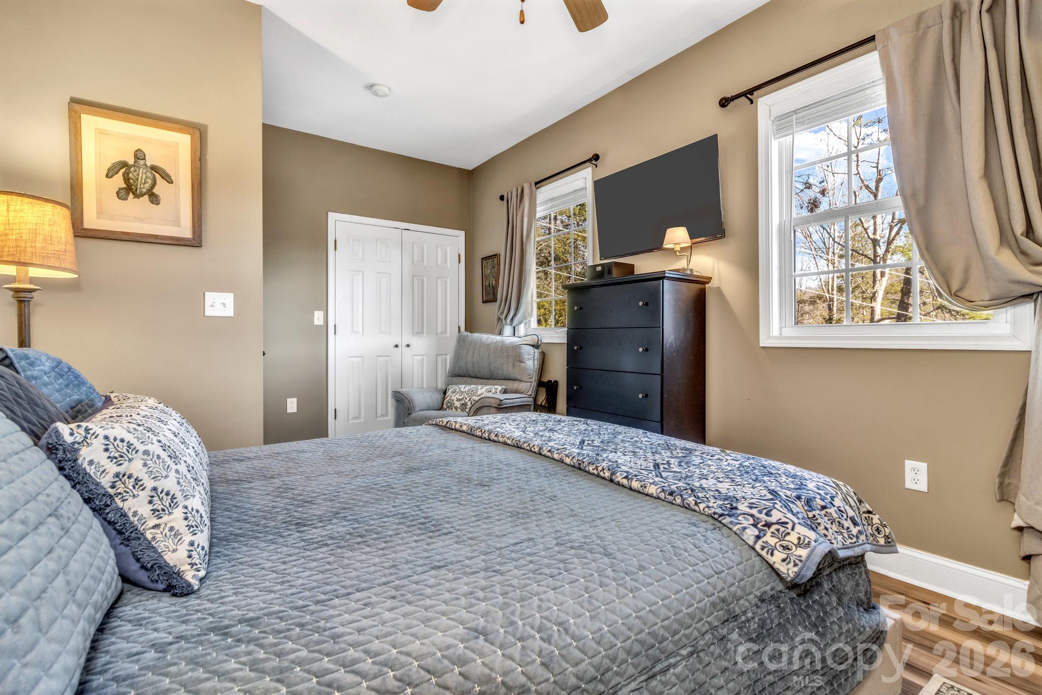 25 Union Chapel Road Weaverville, NC 28787 - Photo 30 of 43 a bedroom with a bed and a window