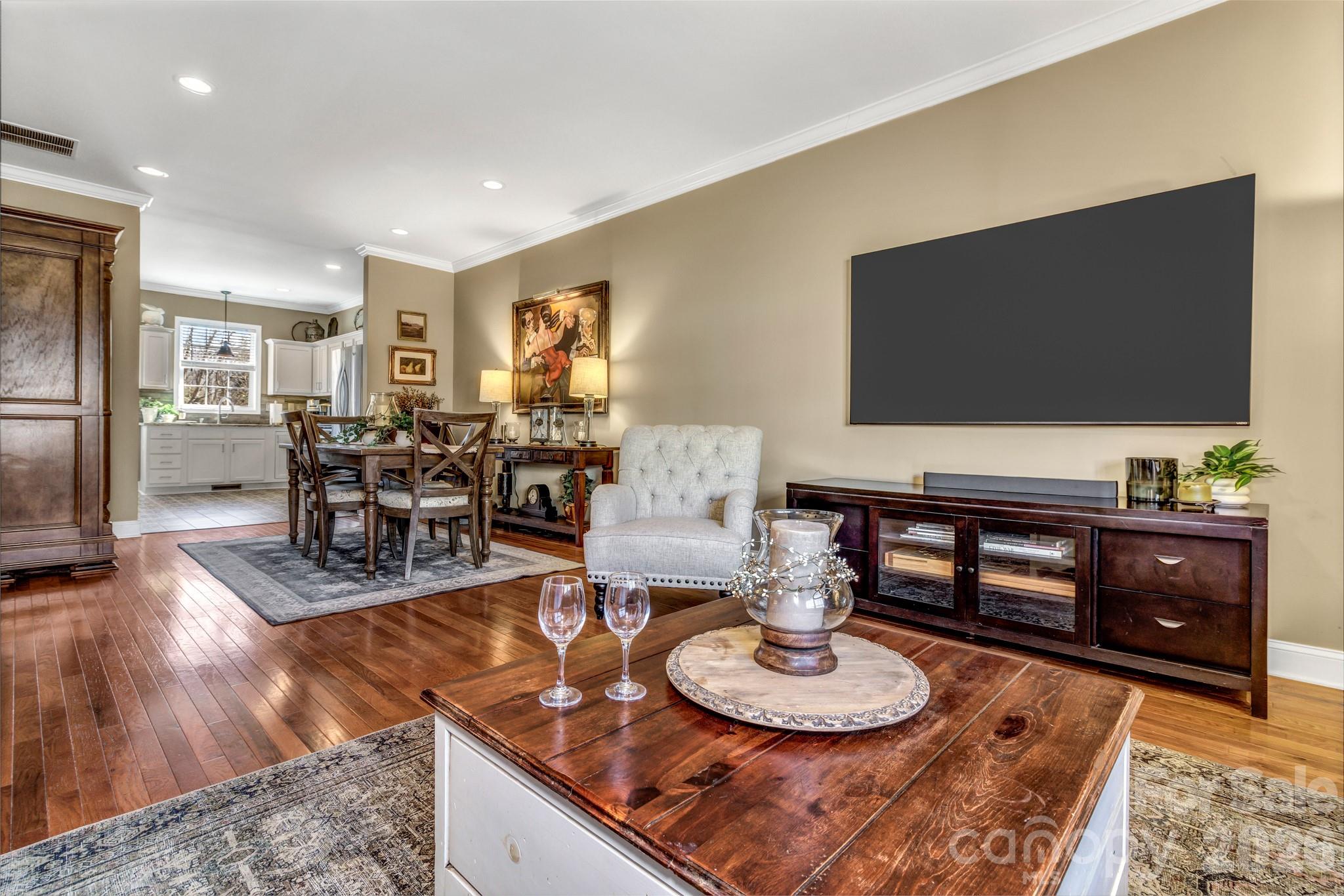 25 Union Chapel Road Weaverville, NC 28787 - Photo 7 of 43 a living room with furniture and a flat screen tv