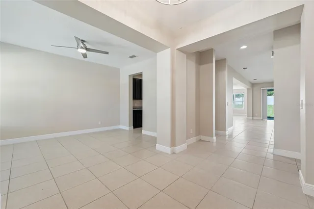 a view of an empty room with a bathroom