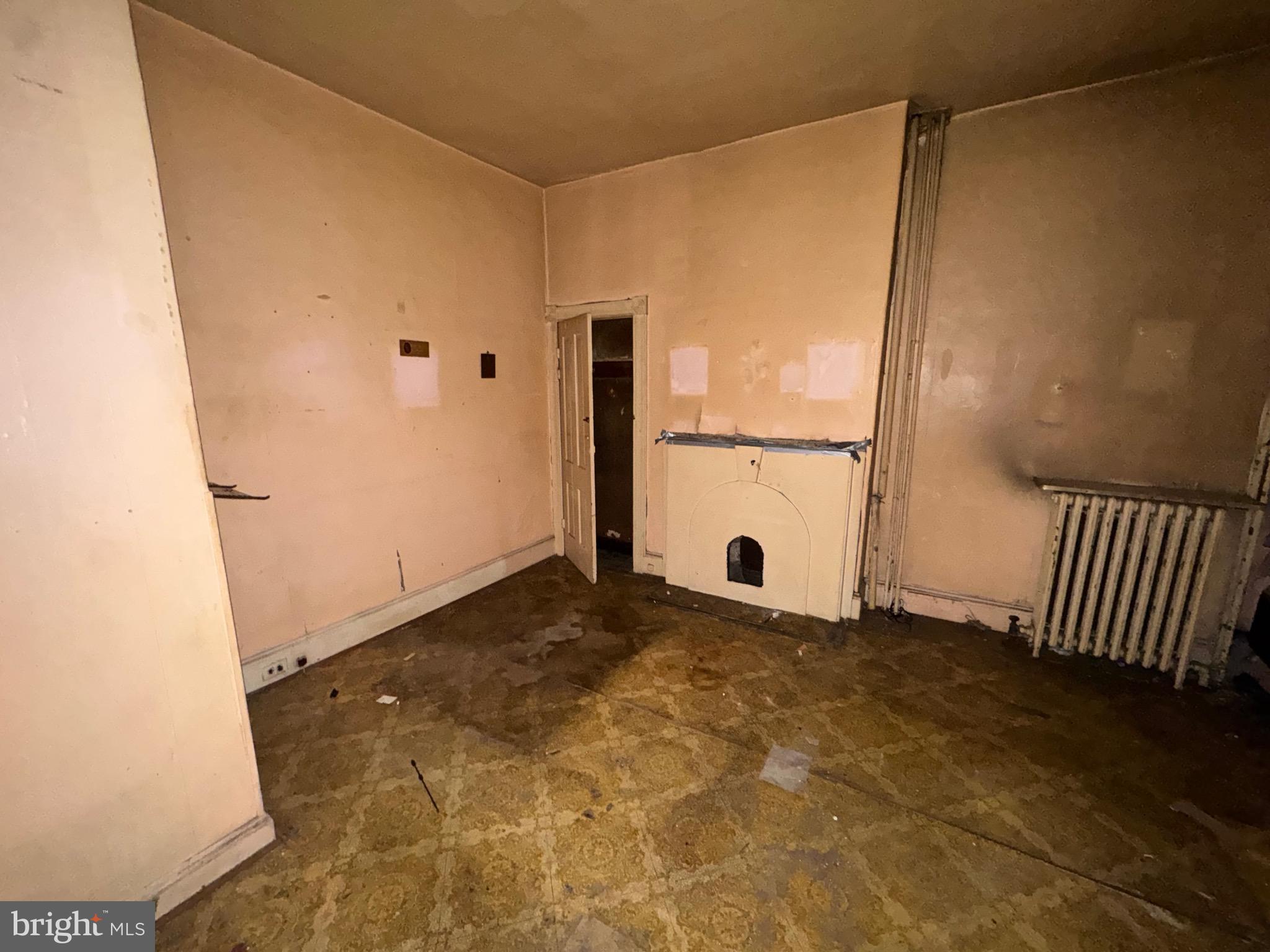 105 North Fulton Avenue Baltimore, MD 21223 - Photo 13 of 38 a view of a room with a door