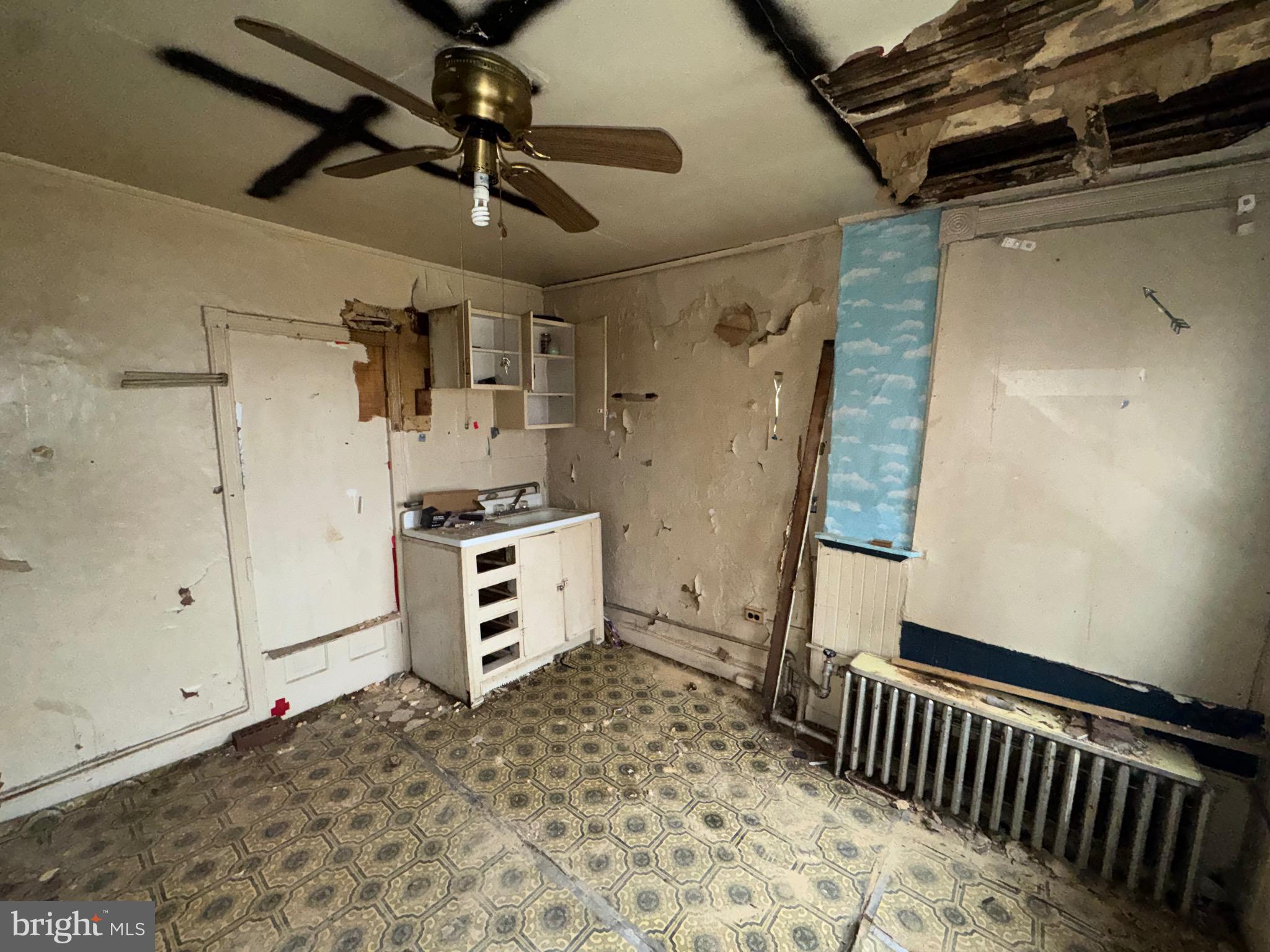 105 North Fulton Avenue Baltimore, MD 21223 - Photo 23 of 38 a view of storage and utility room