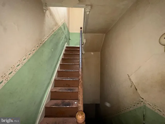 a living room with a couch and a flat screen tv