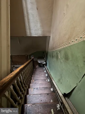 a view of balcony with wooden floor