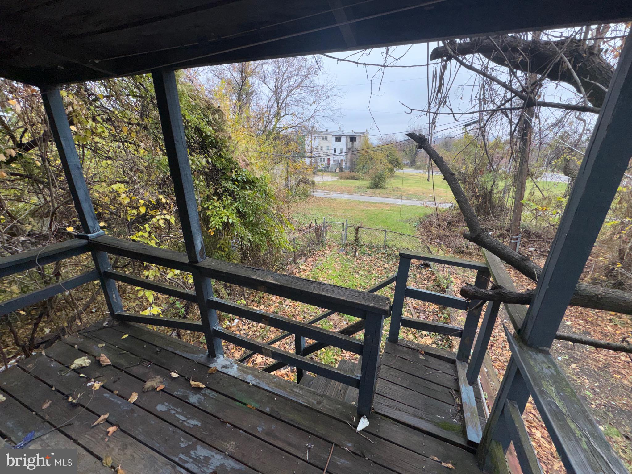 105 North Fulton Avenue Baltimore, MD 21223 - Photo 36 of 38 a view of a two chair in the balcony