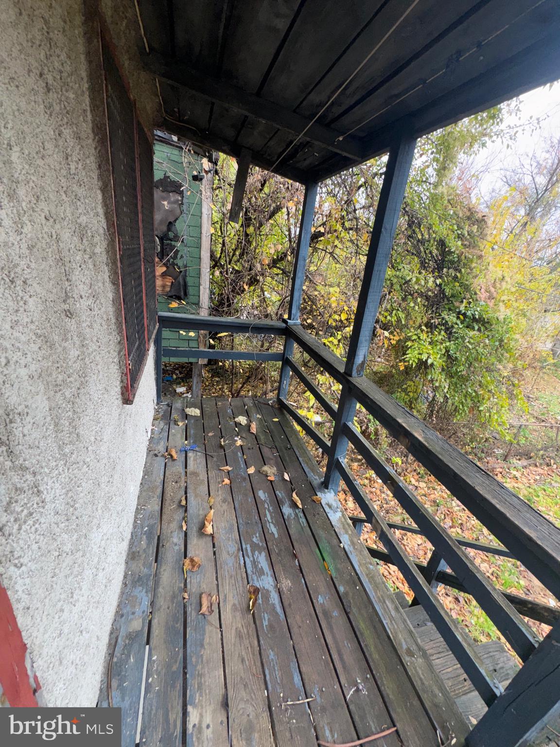 105 North Fulton Avenue Baltimore, MD 21223 - Photo 37 of 38 a view of balcony with wooden floor