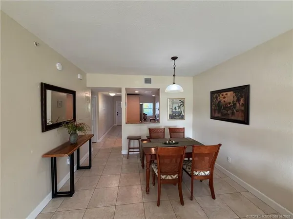 a view of a dining room with furniture