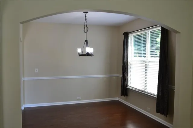 a view of empty room with windows