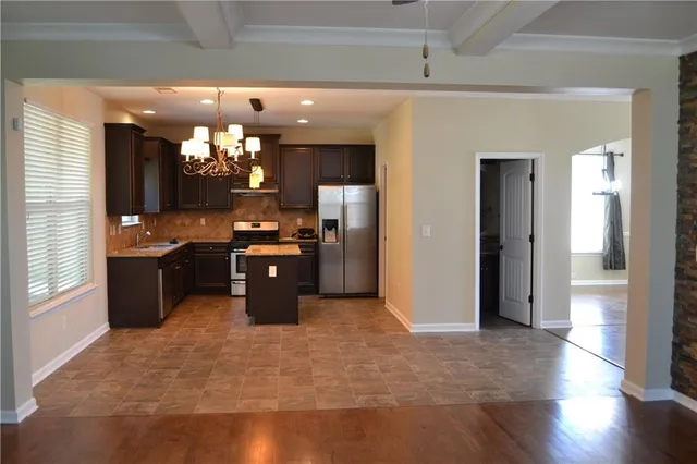 a view of a livingroom with wooden floor