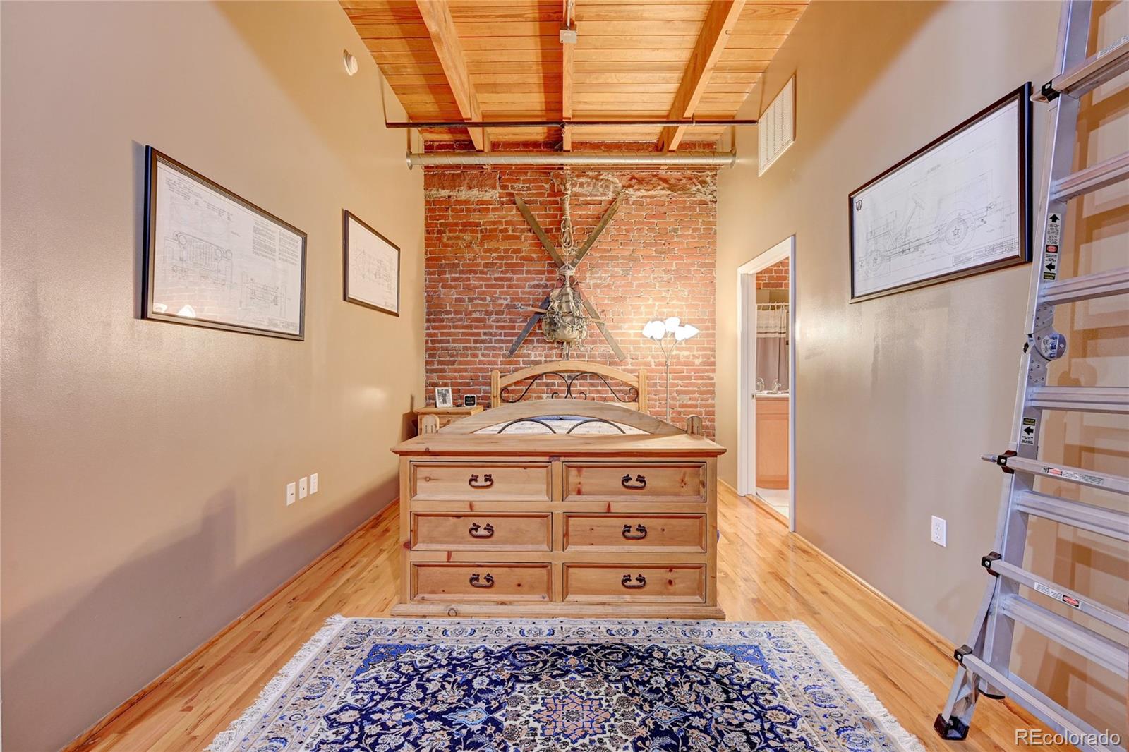 2960 Inca Street, Unit 313 Denver, CO 80202 - Photo 16 of 27 a room with toys and a rug