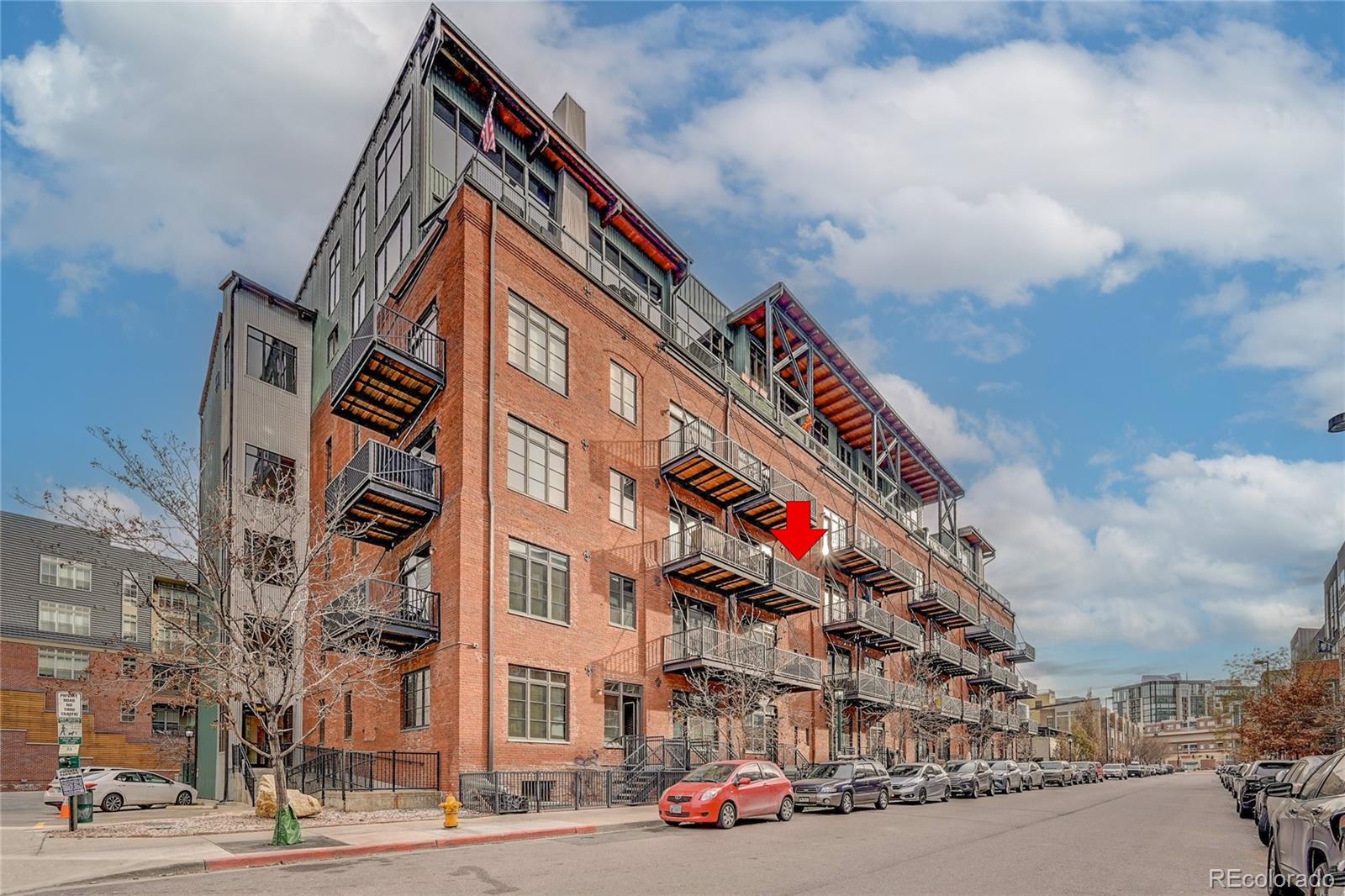 2960 Inca Street, Unit 313 Denver, CO 80202 - Photo 26 of 27 a front view of a multi story building