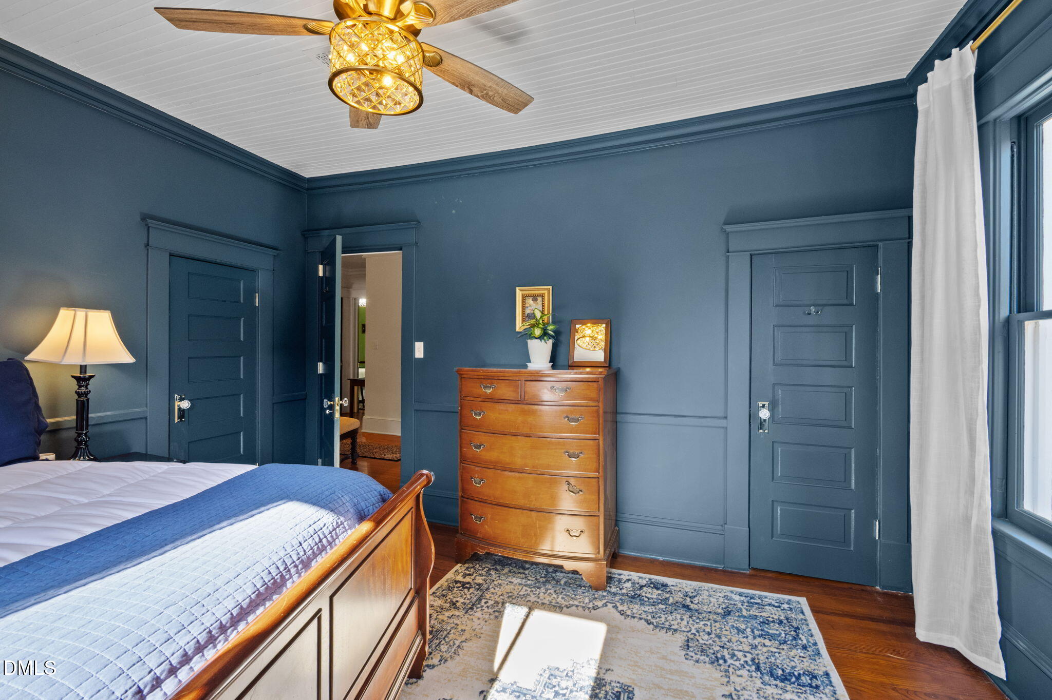 7891 Boston Road Roxboro, NC 27574 - Photo 42 of 85 a bedroom with a bed and a dresser
