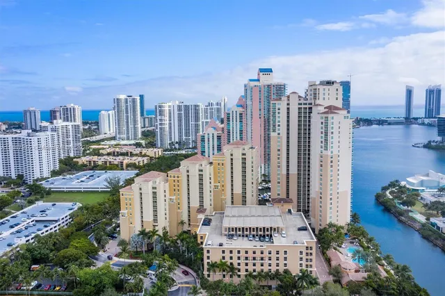a view of a city with tall buildings