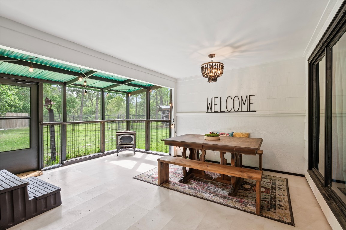 1908 Deats Road Dickinson, TX 77539 - Photo 16 of 41 Enjoy breakfast or coffee in the enclosed patio area.