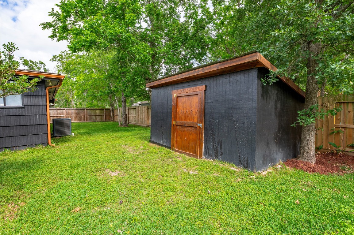 1908 Deats Road Dickinson, TX 77539 - Photo 31 of 41 Large storage shed in the backyard.
