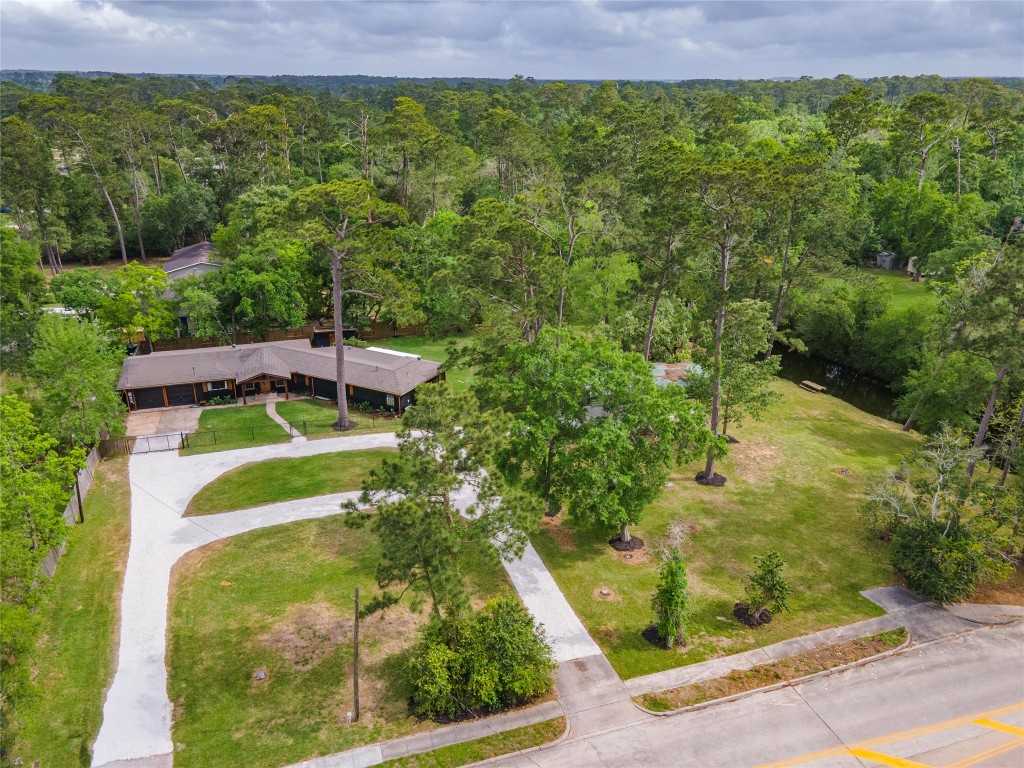 1908 Deats Road Dickinson, TX 77539 - Photo 4 of 41 Welcome to this charming 4 bedroom 2 full bath home located on approximately 1 acre of creek side property situated in the heart of Dickinson TX.