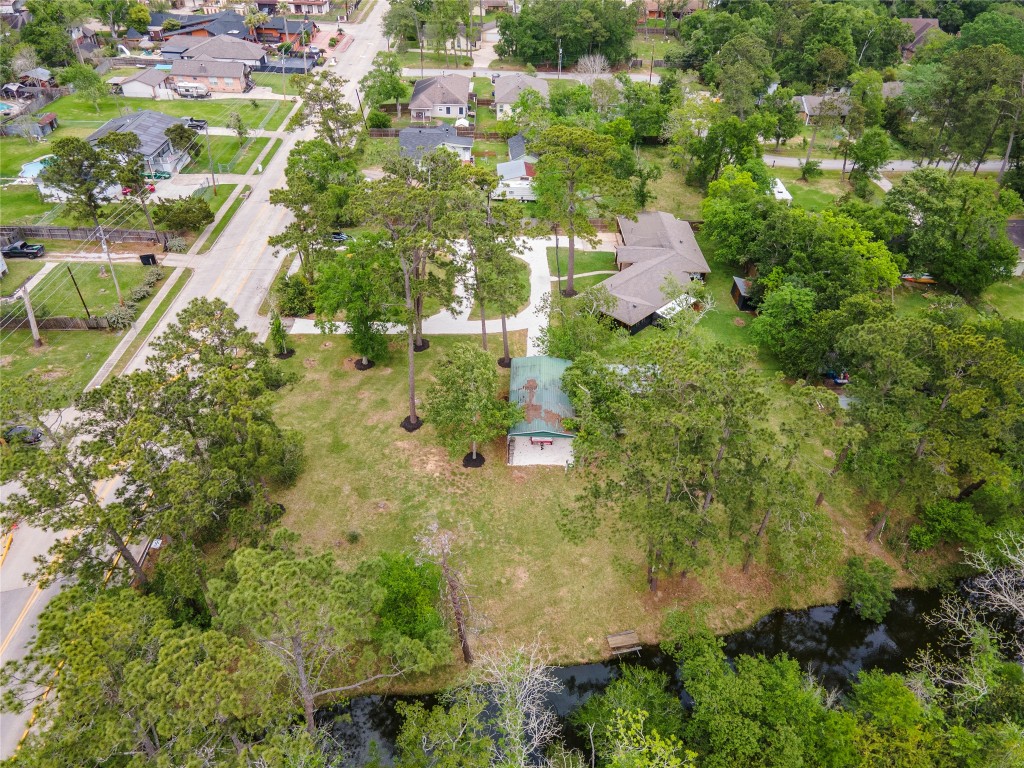 1908 Deats Road Dickinson, TX 77539 - Photo 40 of 41 Aerial view of the property and bayou frontage. Mature trees throughout the property.