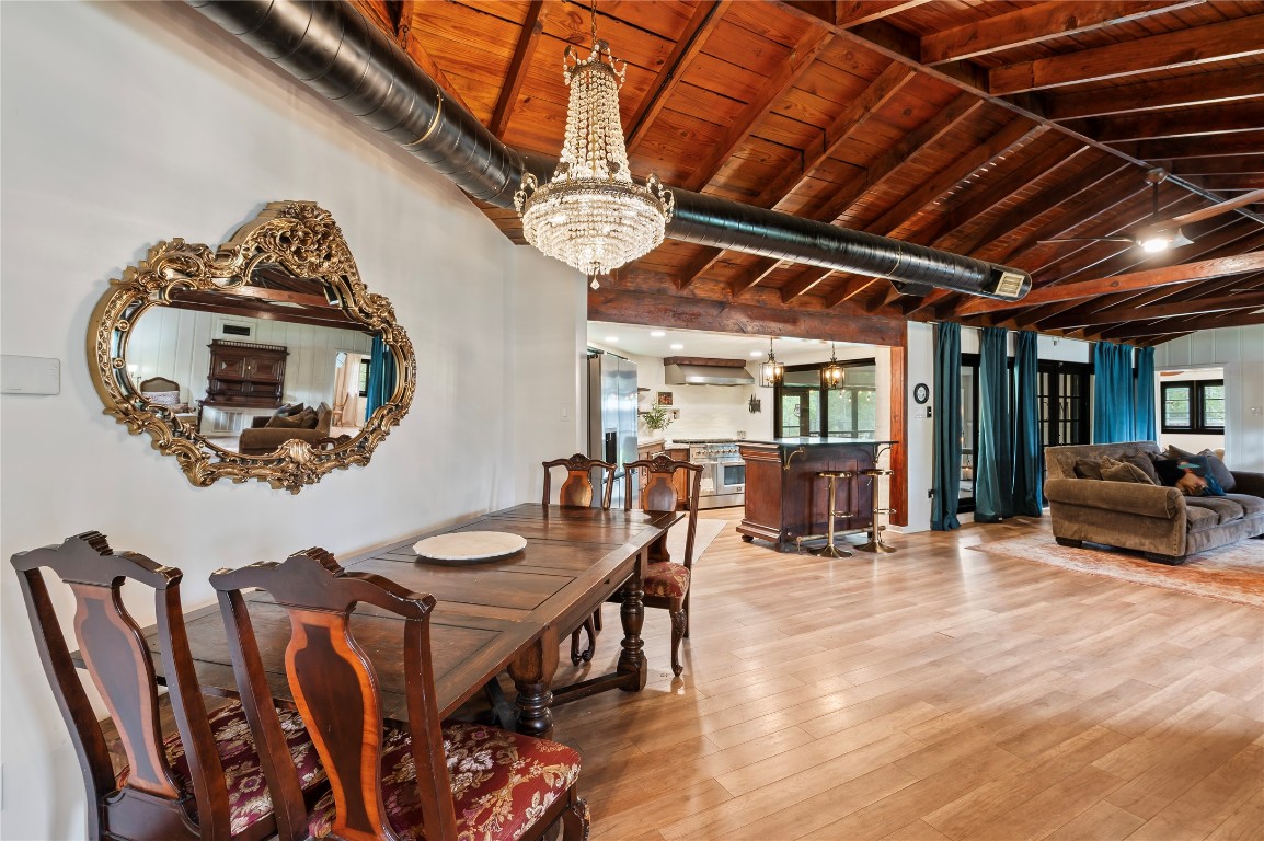 1908 Deats Road Dickinson, TX 77539 - Photo 41 of 41 Large open floor plan with spacious dining area. More wood ceilings and hanging light fixtures.