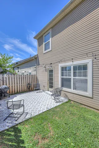 a view of a backyard with a garden