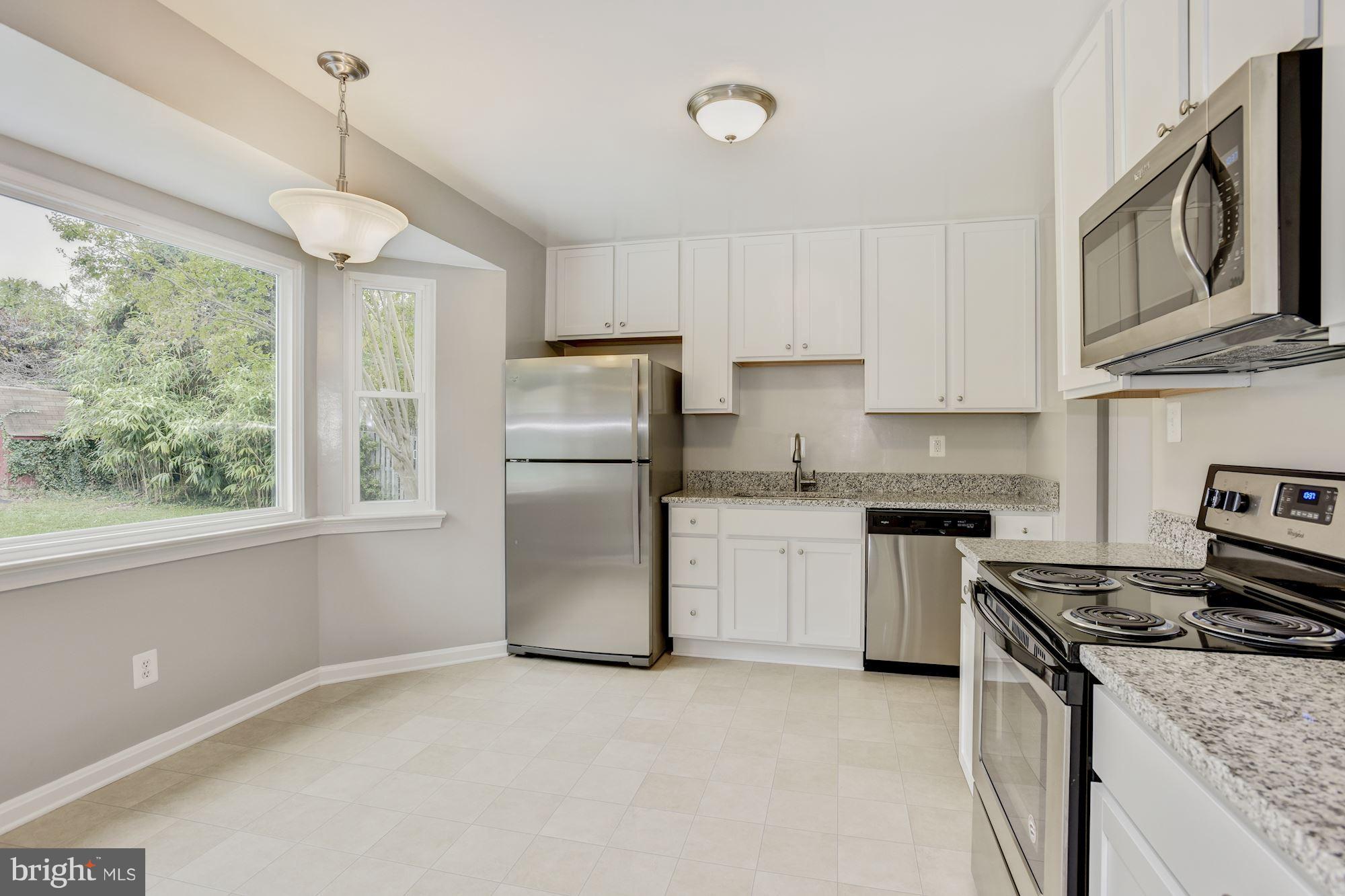 7110 Adelphi Road Hyattsville, MD 20782 - Photo 7 of 27 Kitchen