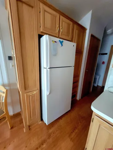 a kitchen with stainless steel appliances a stove a microwave and cabinets