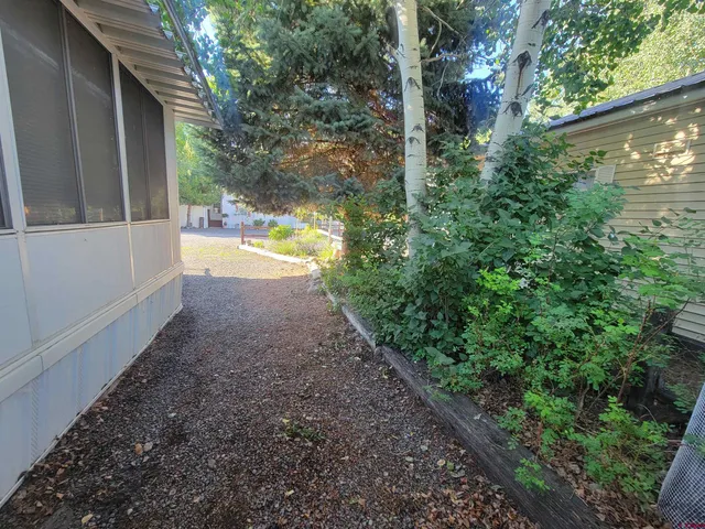 a view of a yard with an outdoor space