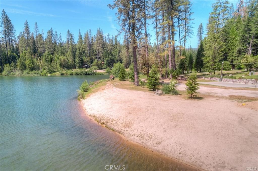 0 Pavlik Pines Road Berry Creek, CA 95916 - Photo 22 of 26 a view of a lake with houses