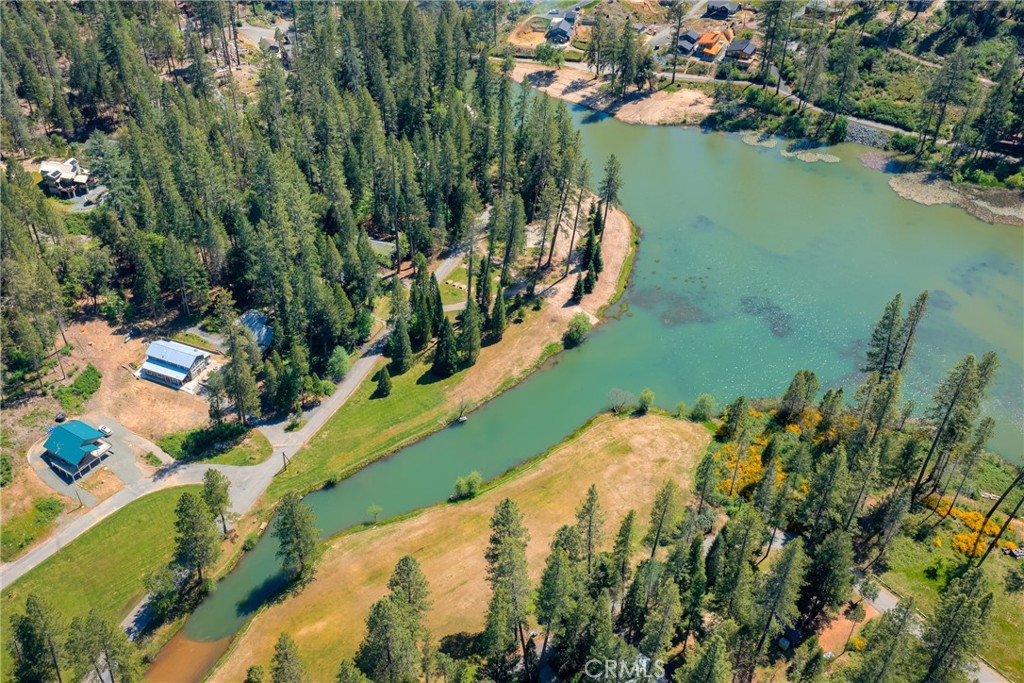 0 Pavlik Pines Road Berry Creek, CA 95916 - Photo 10 of 26 an aerial view of a house with a lake view