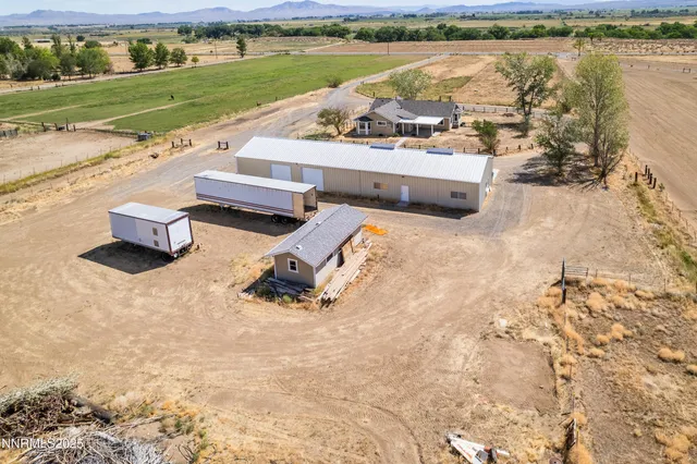 swimming pool view with a lake view