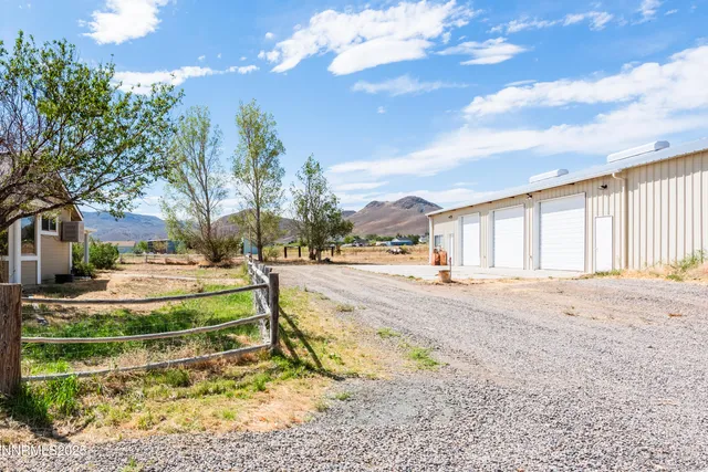 a kitchen with a cabinets and a window