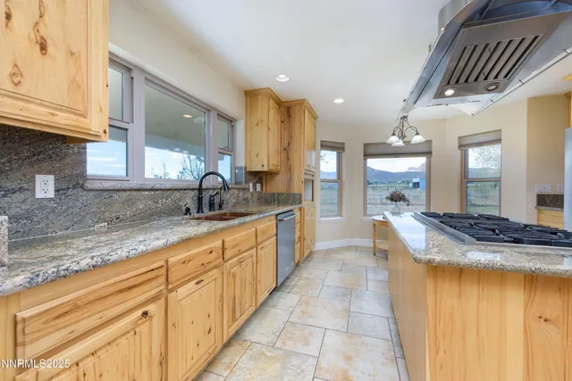 a view of a livingroom with a furniture and chandelier