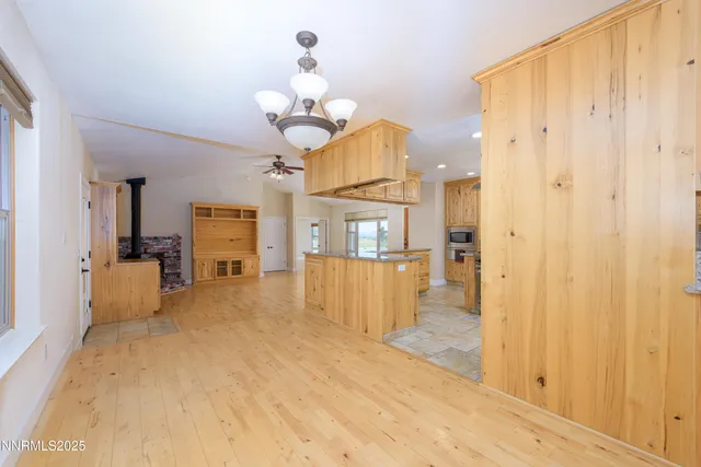 a view of livingroom with kitchen and dining area