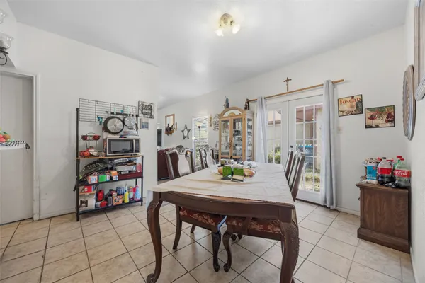 a kitchen with a stove and a refrigerator
