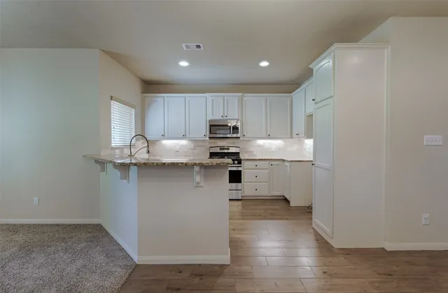 $1,550 | 12960 Orion Court East, Willis, TX 77318