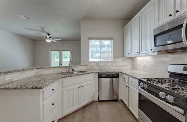 $1,550 | 12960 Orion Court East, Willis, TX 77318