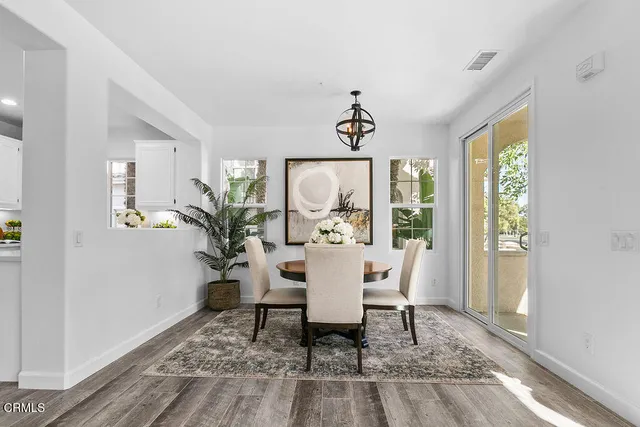 a vase of flowers sitting on a table
