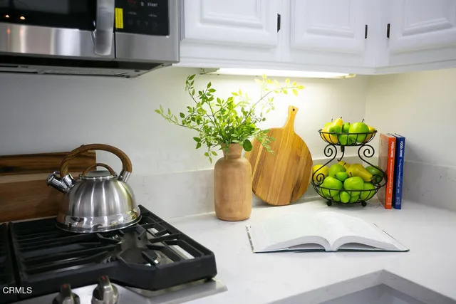 a potted plant sitting on top of a shelf